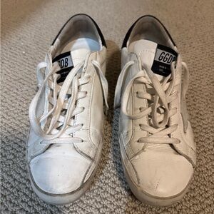 Golden Goose Superstar Cream and Black Sneakers